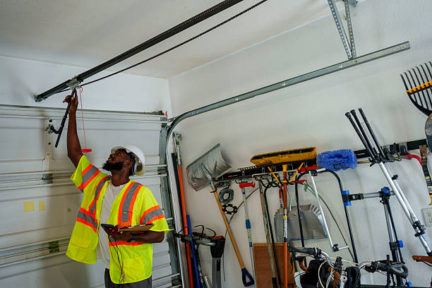 Professional Garage Door Roller Replacement technician working in Aquebogue, NY
